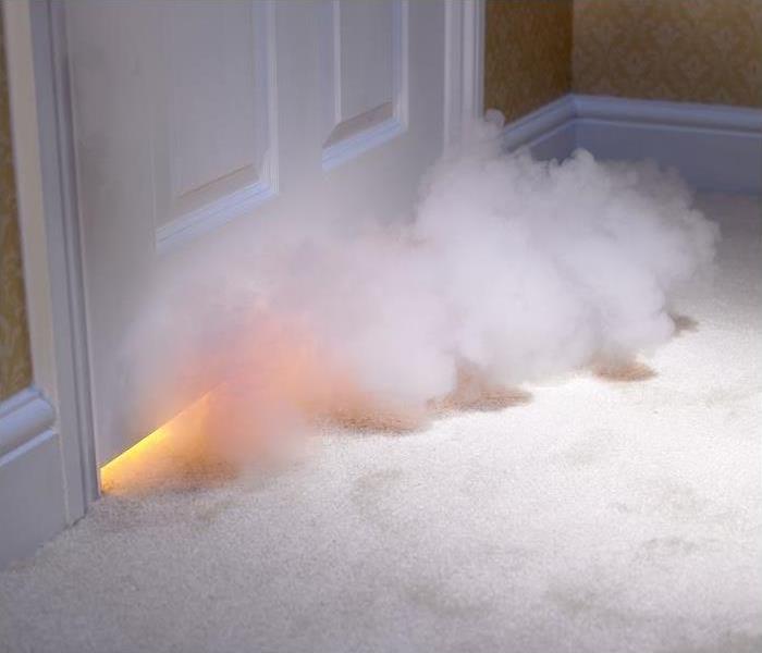Smoke entering room from under the door